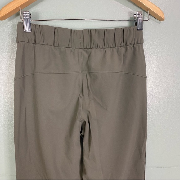 Lululemon On The Fly Pant 7/8 Green Sz 4 W5BLPS - Picture 4 of 6